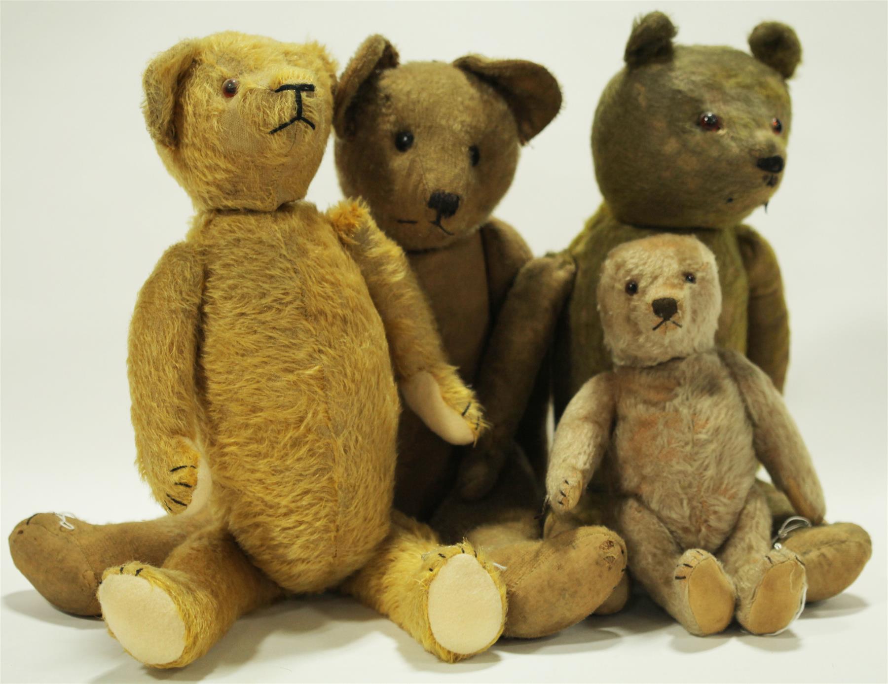 Appraisal: FOUR WELL LOVED MOHAIR BEARS American or German early th