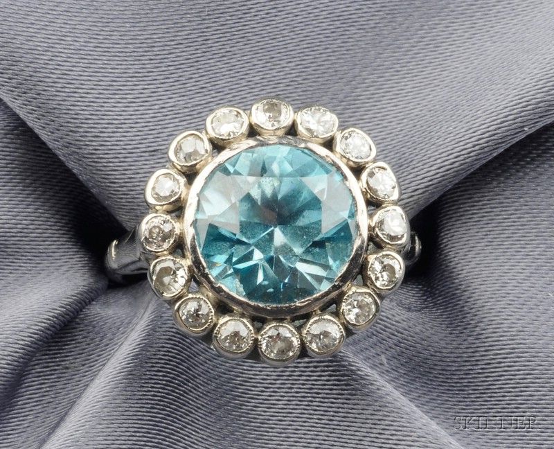 Appraisal: kt White Gold Blue Zircon and Diamond Ring bezel-set with