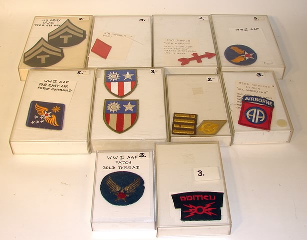 Appraisal: Lot of US military patches cased in individual plastic boxes