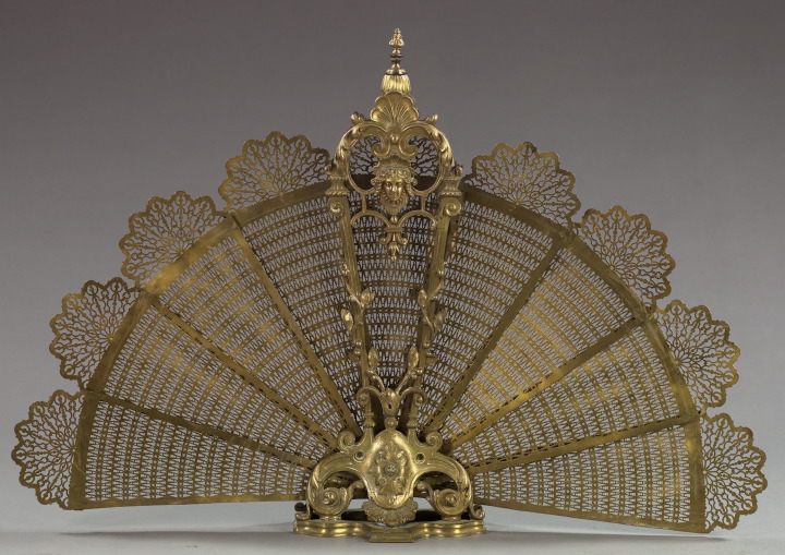 Appraisal: French Cast and Reticulated Brass Folding Firescreen of fan form