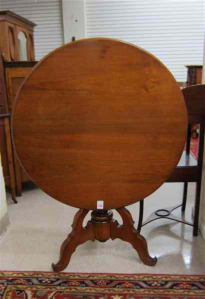 Appraisal: ROUND MAHOGANY TILT-TOP TEA TABLE American th century the round