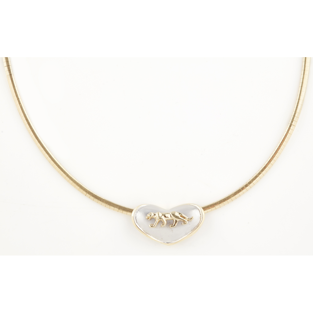 Appraisal: A contemporary pendant necklace the silvered heart with applied jaguar