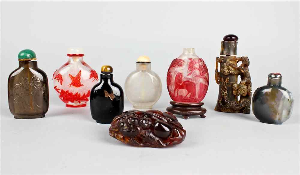 Appraisal: GROUP OF EIGHT CHINESE SNUFF BOTTLES including amber bottles Beijing