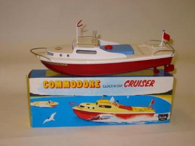 Appraisal: A Commodore cruiser clockwork white deck red hull long -