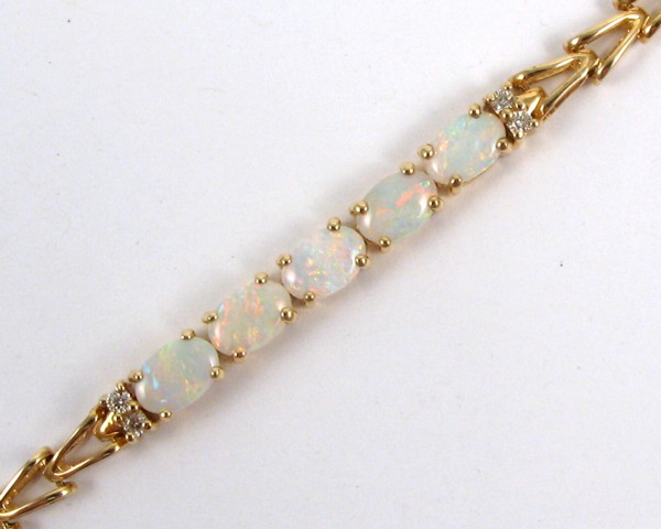 Appraisal: OPAL DIAMOND AND YELLOW GOLD BRACELET - in length with