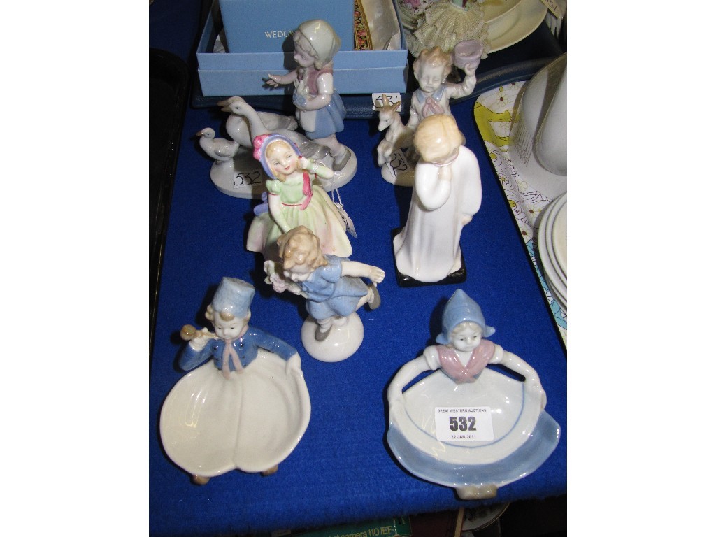 Appraisal: Lot comprising two Doulton figures 'Babie' HN 'Darling' HN and