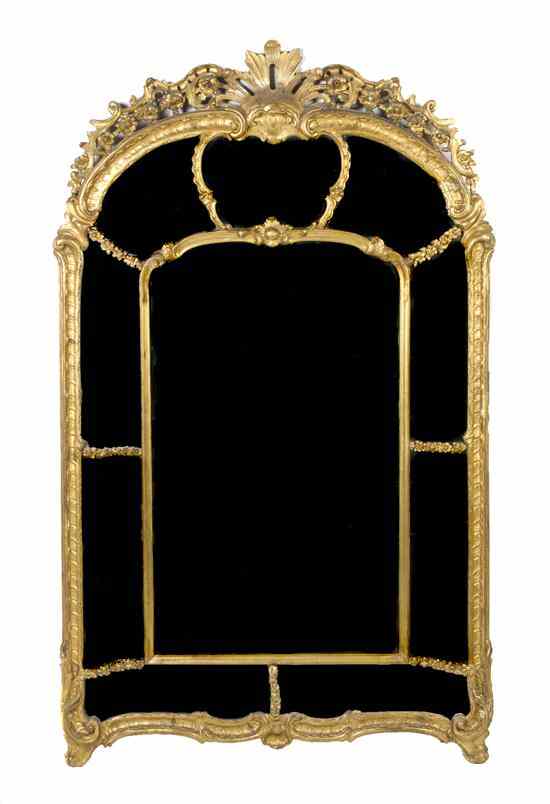 Appraisal: A Louis XV Style Giltwood Pier Mirror having a pierce