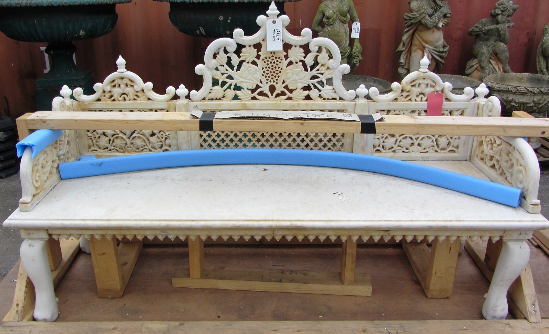 Appraisal: A th century carved white marble bench with pierced decoration