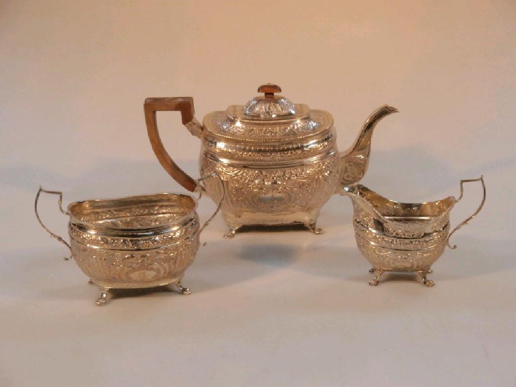 Appraisal: An American white metal three-piece tea service stamped Sterling of