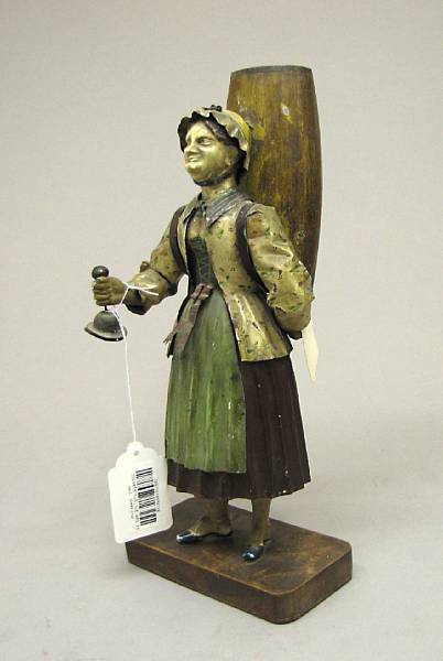 Appraisal: A German painted tole figural bouquetiere th century Depicting a