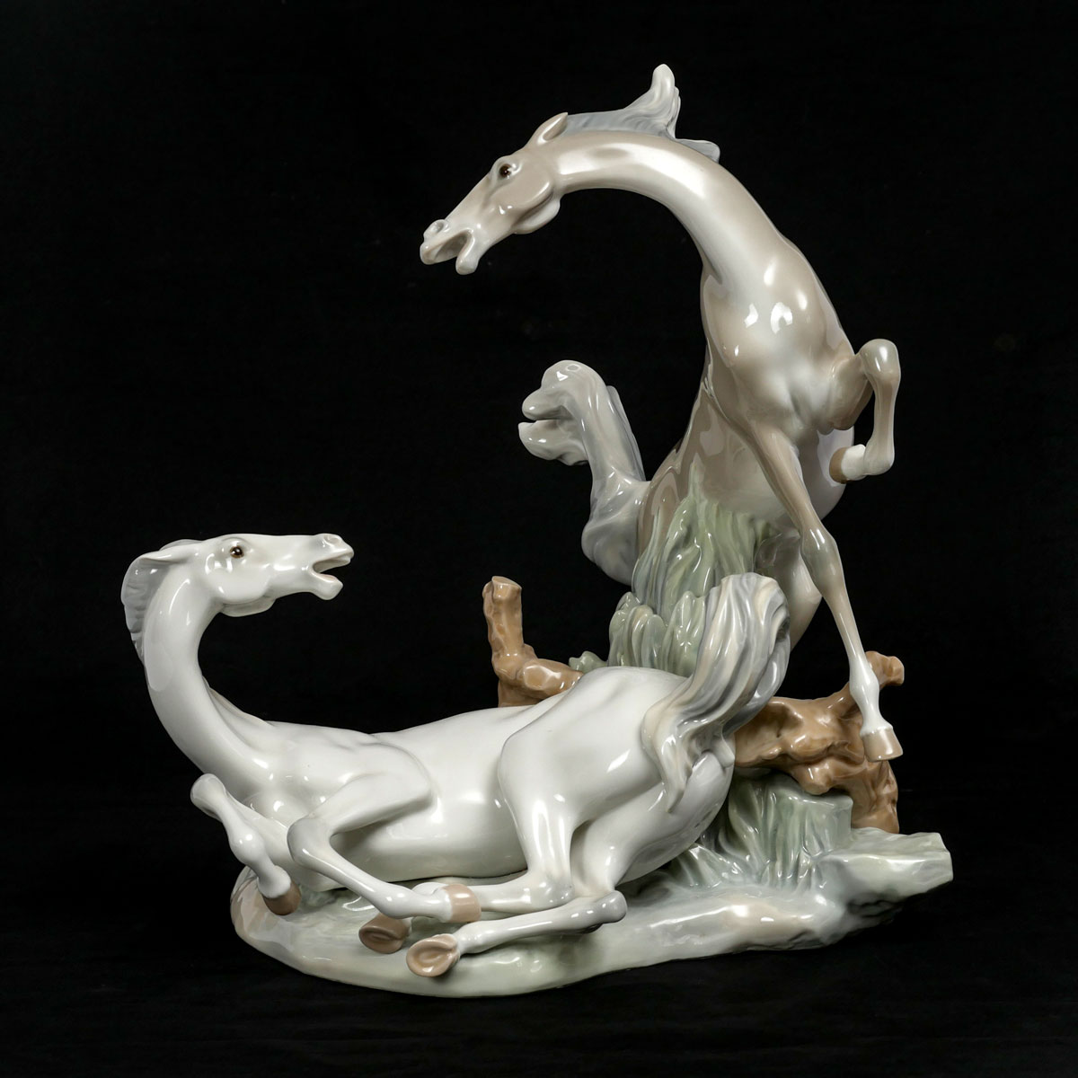 Appraisal: LLADRO PORCELAIN HORSE GROUPING Large Lladro porcelain grouping of playful