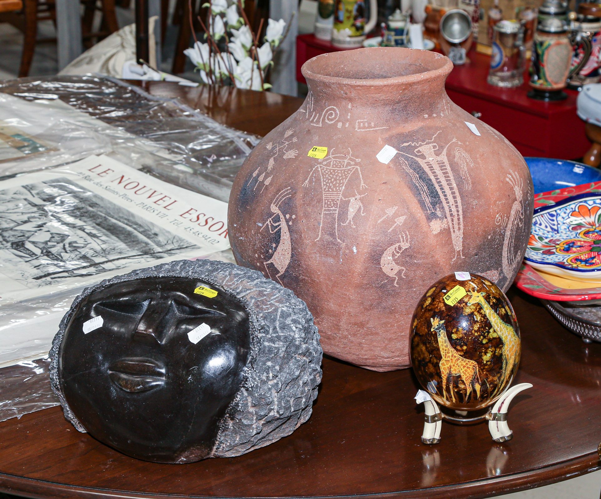 Appraisal: THREE DECORATIVE ITEMS Including decorated Ostrich egg on stand in