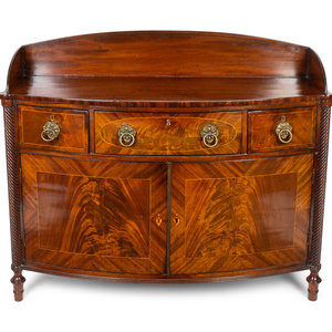 Appraisal: A Regency Carved and Figured Mahogany Satinwood Inlaid Bow-front Server