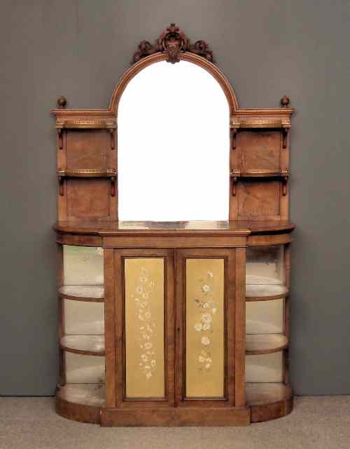 Appraisal: A Victorian figured walnut chiffonier the back with arched top