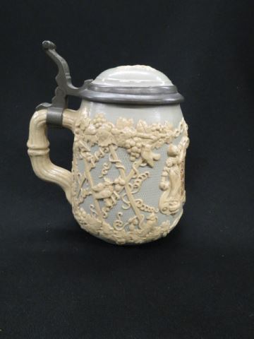 Appraisal: Mettlach Pottery Stein verse floral bas-relief inlaid pewter lid liter