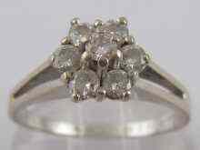 Appraisal: A white metal tests carat gold diamond cluster ring estimated