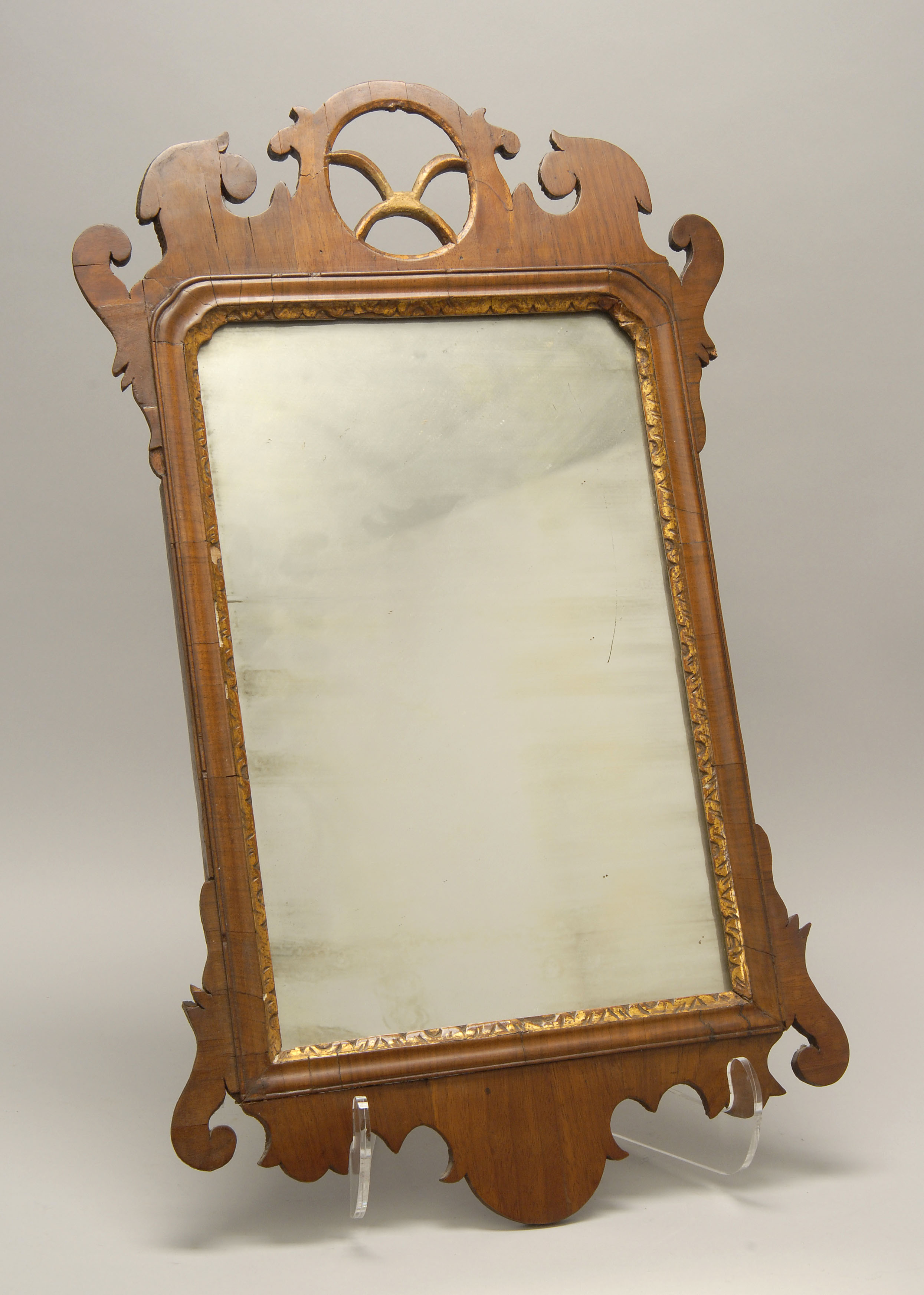 Appraisal: ANTIQUE AMERICAN CHIPPENDALE MIRROR Circa sWith central round crest and