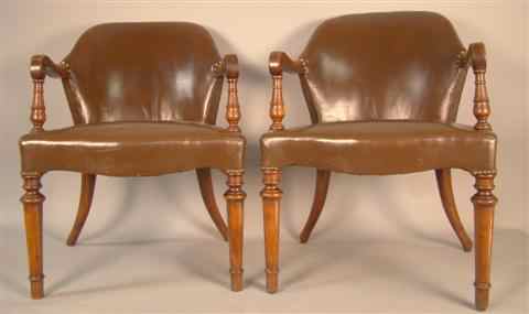 Appraisal: PAIR OF WALNUT ARM CHAIRS WITH BROWN LEATHER SEATS AND