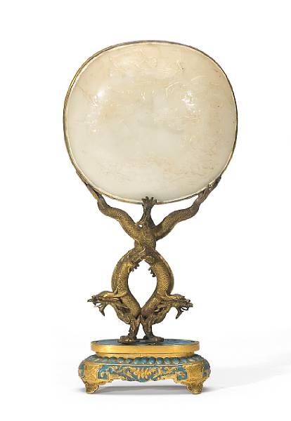 Appraisal: A greenish white jade plaque in a gilt and enameled