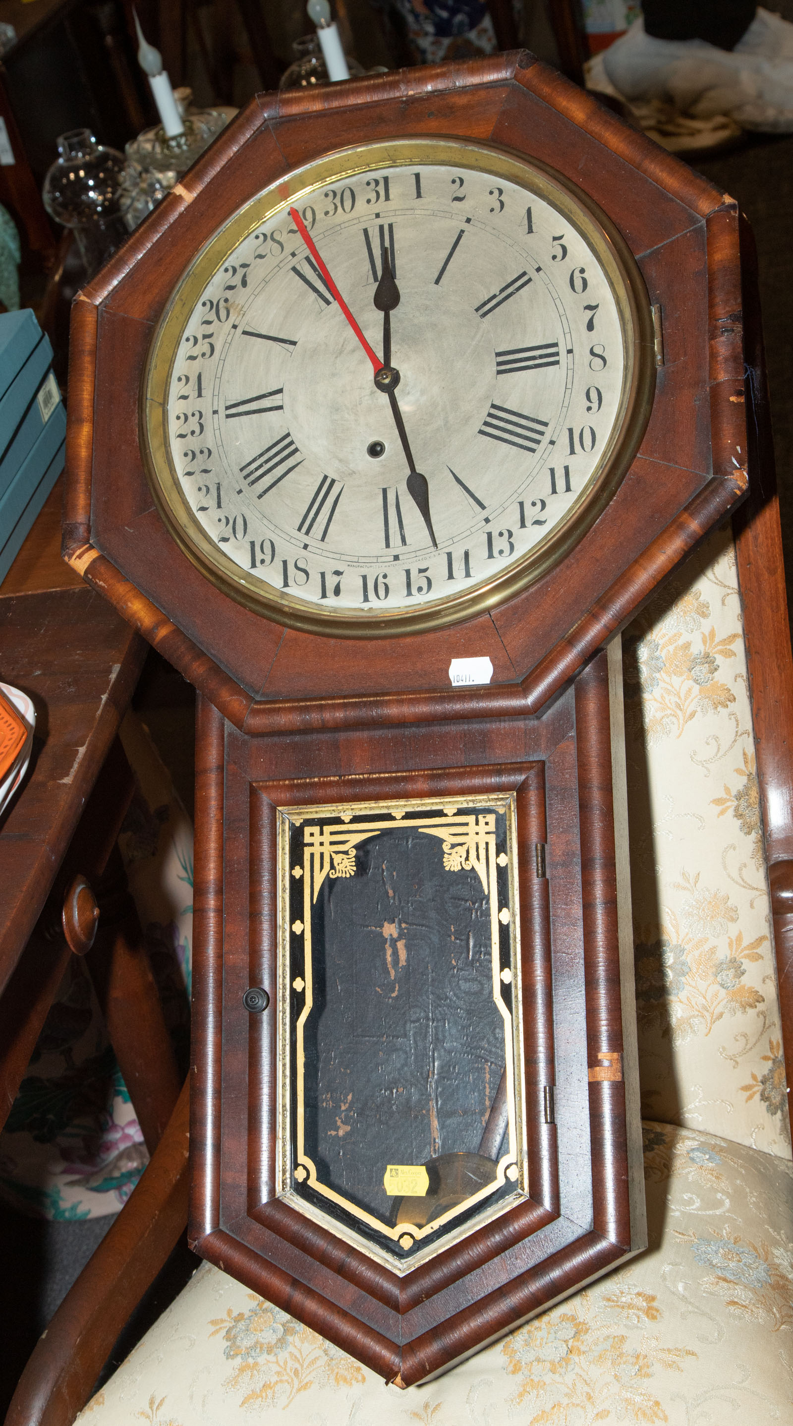 Appraisal: WATERBURY CALENDAR WALL CLOCK Late th century in mahogany and