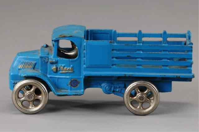 Appraisal: ARCADE MACK STAKE TRUCK Nice scale cast iron painted in