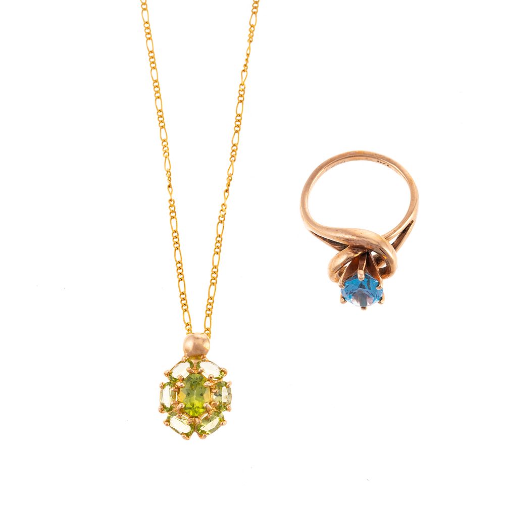 Appraisal: A Blue Topaz Ring Peridot Cluster Pendant in K K