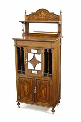 Appraisal: A late Victorian rosewood and marquetry music cabinet the raised