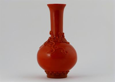 Appraisal: A Chinese coral ground glass vase with a dragon and