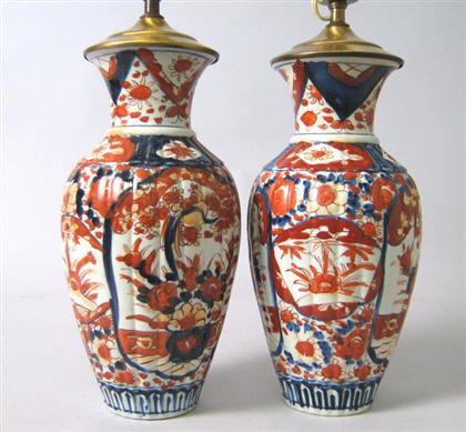 Appraisal: Assembled pair of Imari vases Of baluster form with painted