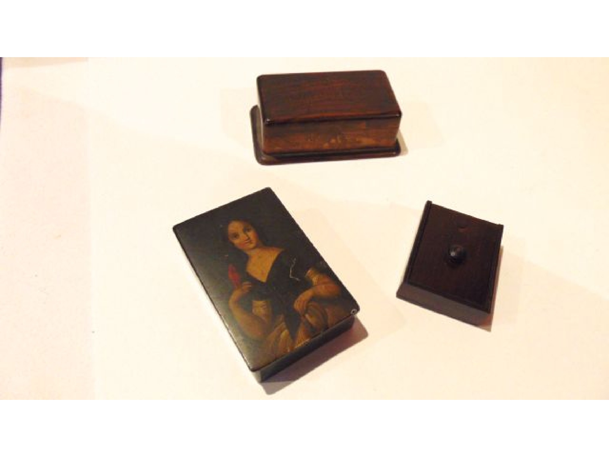 Appraisal: Olive wood stamp box th century black lacquered snuff box