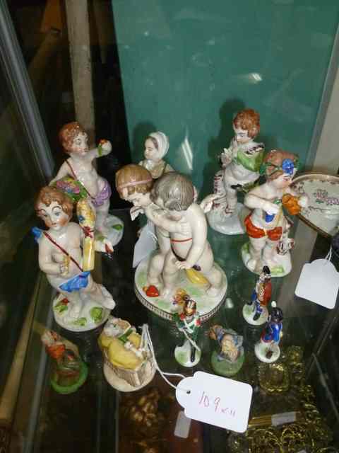 Appraisal: A GROUP OF VARIOUS CONTINENTAL PORCELAIN FIGURES to include four