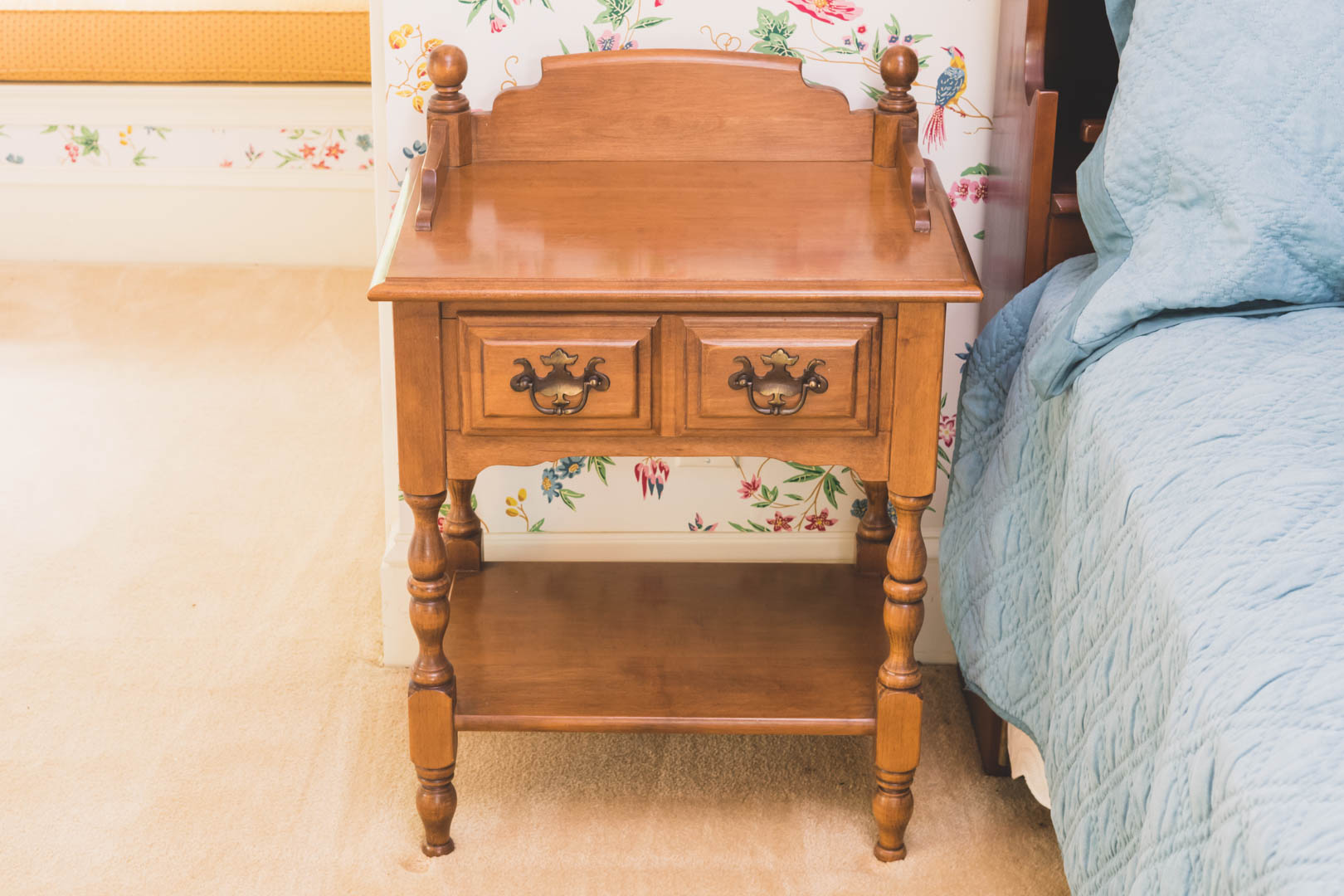 Appraisal: Traditional style turned cherrywood candle stand in H in Diam