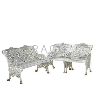 Appraisal: CAST IRON GARDEN SET Settee and two chairs outdoor patina