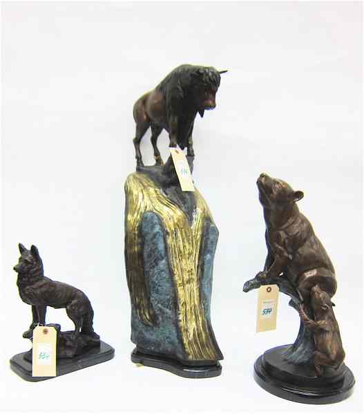 Appraisal: THREE BRONZE WILDLIFE SCULPTURES ''H seated dog ''H bear and