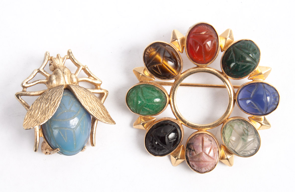 Appraisal: Lady's K gold round scarab brooch with natural carved semi-precious