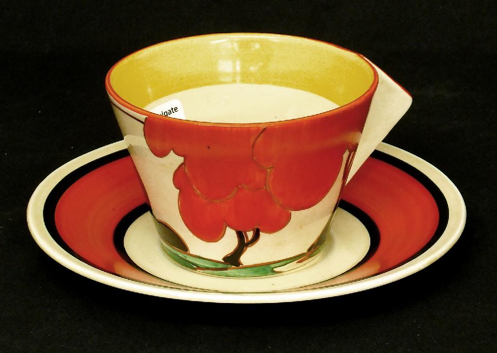 Appraisal: Red Autumn' Fantasque Bizarre conical cup and saucer