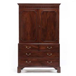 Appraisal: George III Linen Press late th century mahogany mahogany veneer