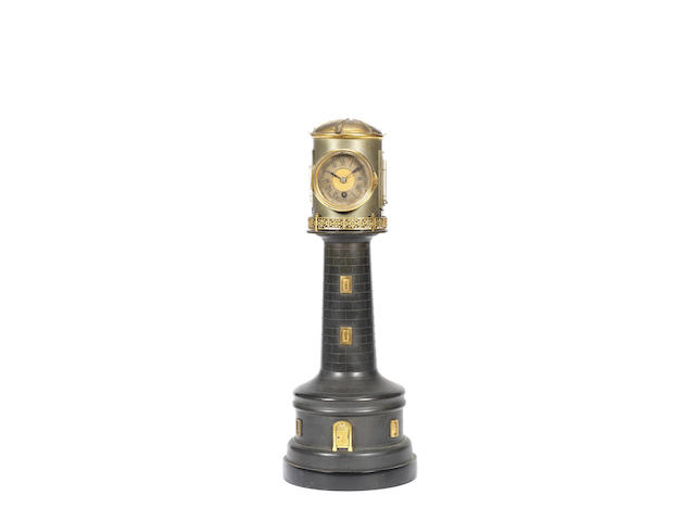 Appraisal: A late th century French patinated and silvered brass lighthouse