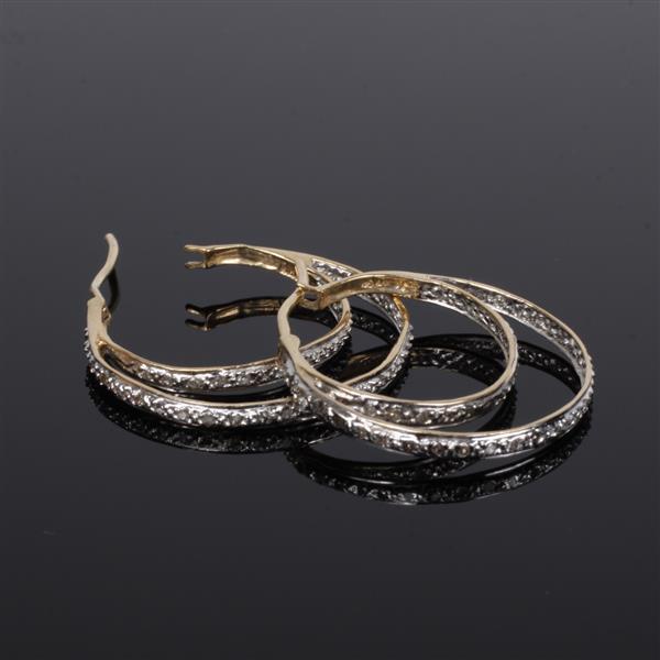 Appraisal: Diamond K Gold Double Hoop Earrings dwt