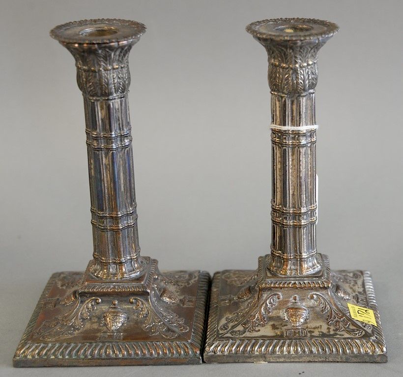 Appraisal: Pair of Sheffield silver plated candlesticks each with gadrooned border