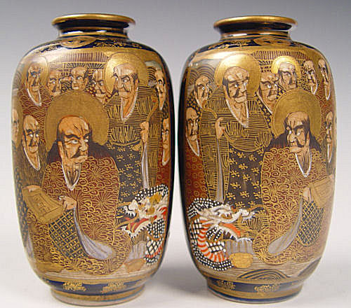 Appraisal: PAIR MIRROR IMAGE JAPANESE SATSUMA VASES Groups of saints and