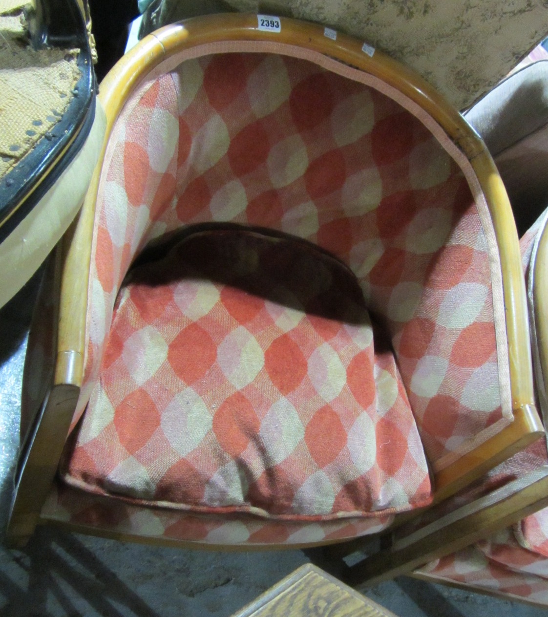 Appraisal: A pair of beech framed tub chairs