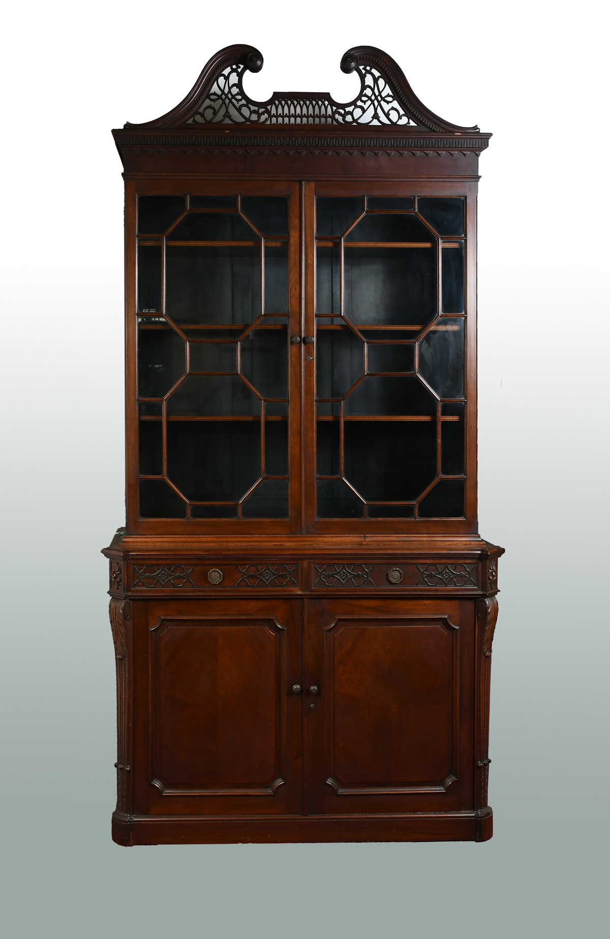 Appraisal: CHIPPENDALE BREAKFRONT BOOKCASE Two door curio with three shelves over