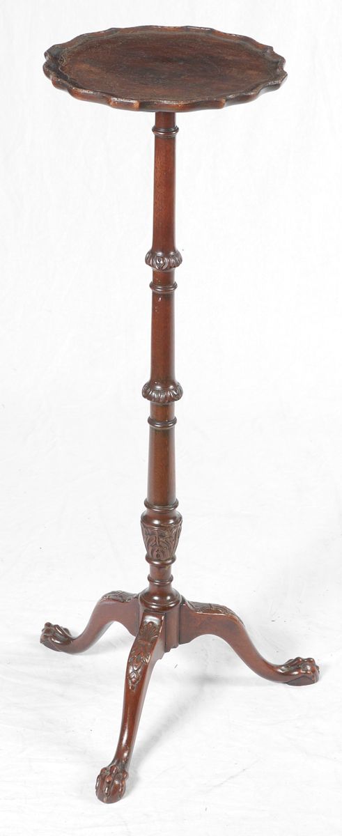 Appraisal: CARVED MAHOGANY FERN STAND Pie crust top with carved trim