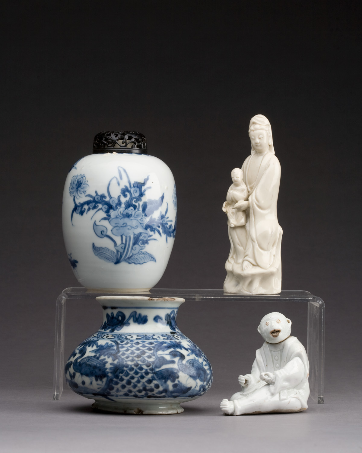 Appraisal: FOUR CHINESE BLANC DE CHINE FIGURES Including two guanyin one