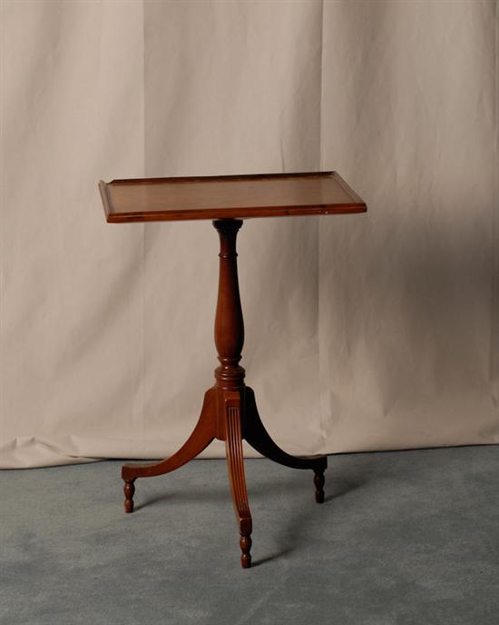 Appraisal: A Mahogany Candlestand with reeded legs and molded gallery top