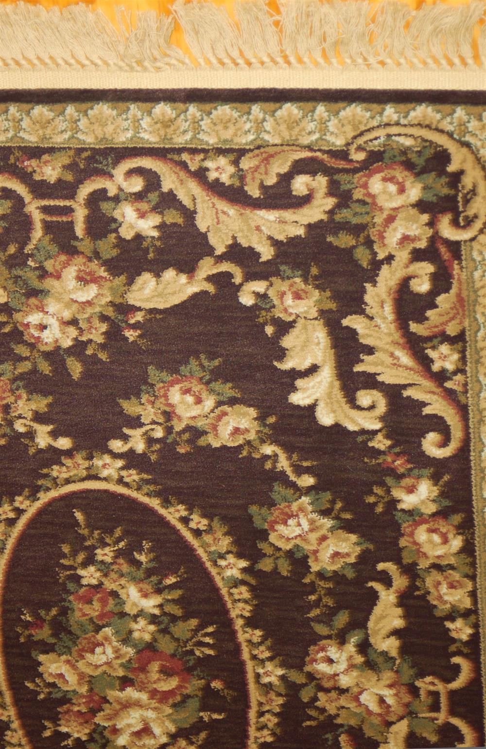 Appraisal: TWO MACHINE MADE SYNTHETIC AUBUSSON STYLE RUGS both identical having