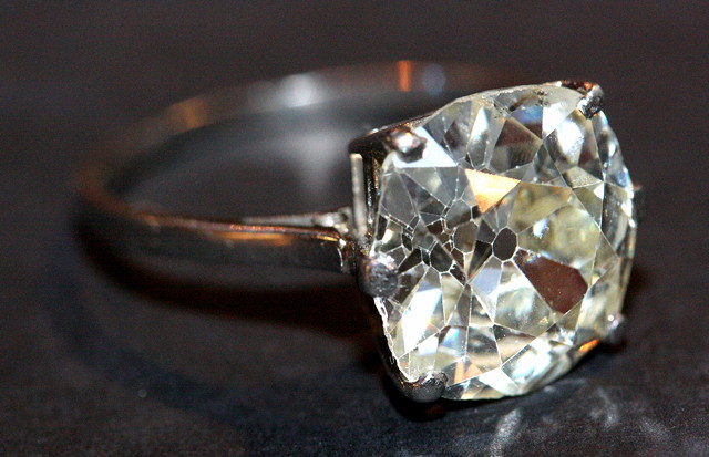 Appraisal: A SOLITAIRE DIAMOND RING old cushion cut diamond set with