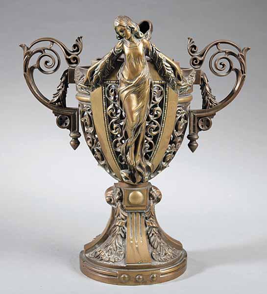 Appraisal: A Continental Art Nouveau Patinated and Polished Brass Urn with