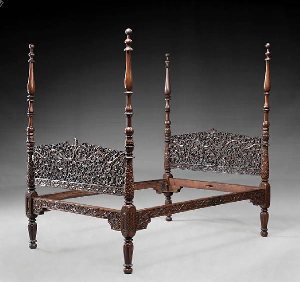 Appraisal: An Anglo Indian rosewood bed th century With pierced and